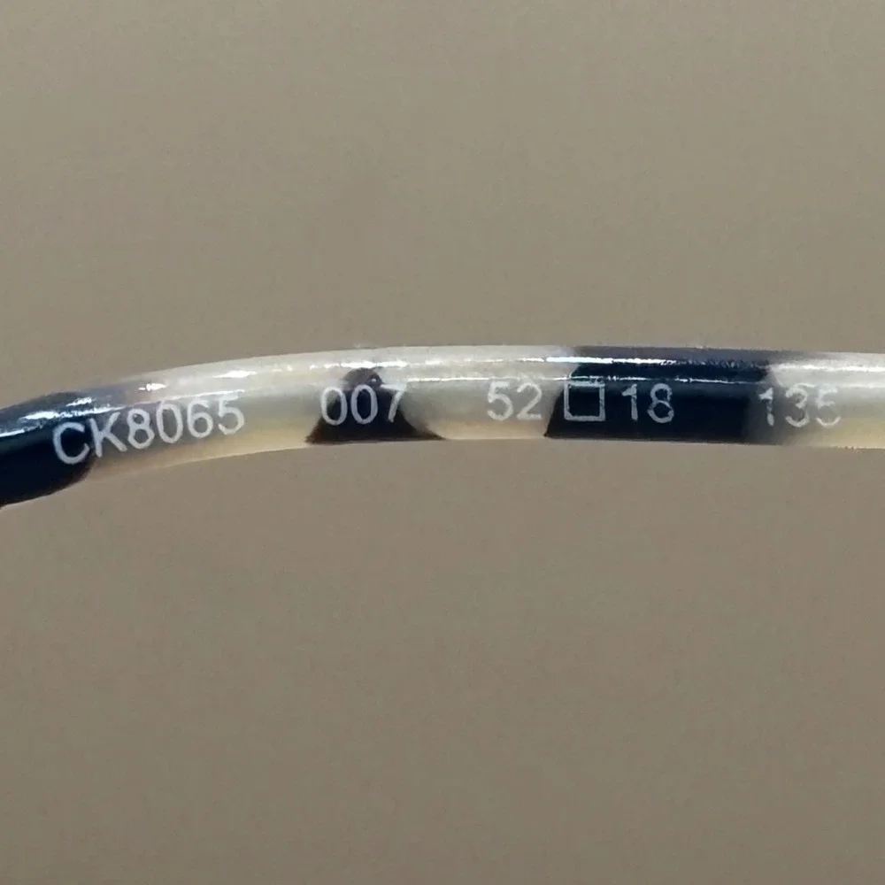 Calvin Klein CK8065 007 Black Gold Titanium Eyeglasses 52-18-135 Japan